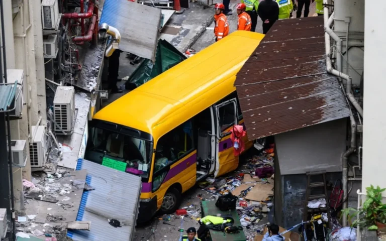 China school bus crashes into crowd, kills 11 including students.