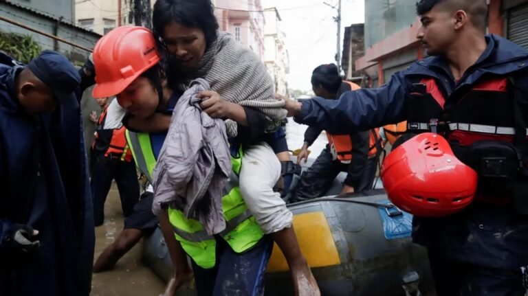 At least 66 dead and dozens missing in Nepal floods.
