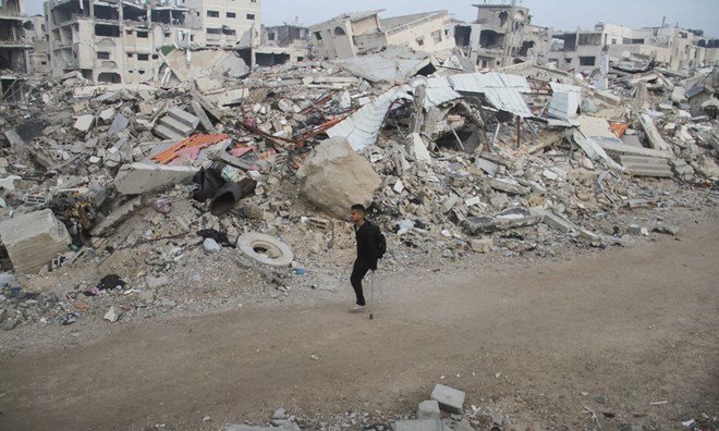 At least 70 Palestinians killed in Gaza airstrikes as Israeli cabinet delays meeting to agree ceasefire.