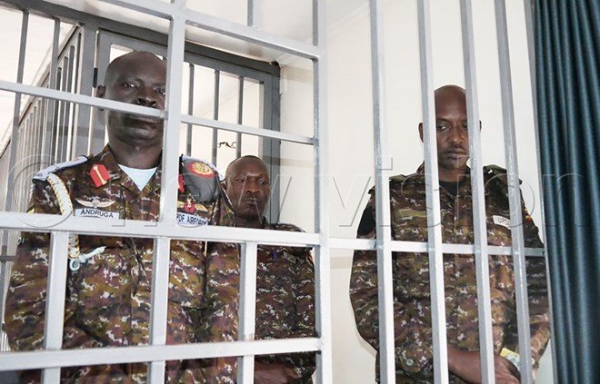 Three Ugandan officers face charges over Somalia helicopter crash.