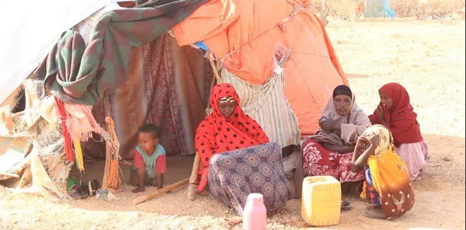 Clan conflict and burning of homes in Adale cause families to flee to the bush