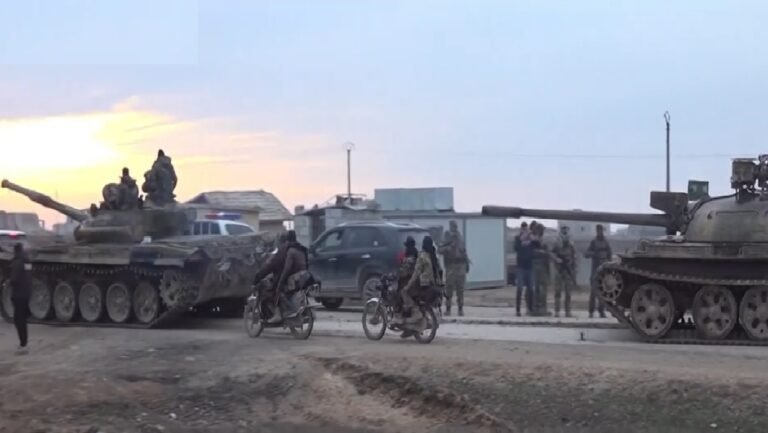 Syrian army takes control of east Aleppo towns as Kurdish fighters withdraw.